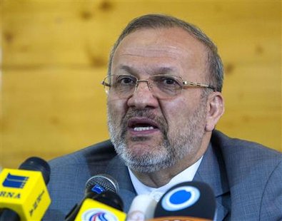 
Iranian Foreign Minister Manouchehr Mottaki speaks with journalists during a news conference in Tehran June 29, 2010. REUTERS/Raheb Homavandi
