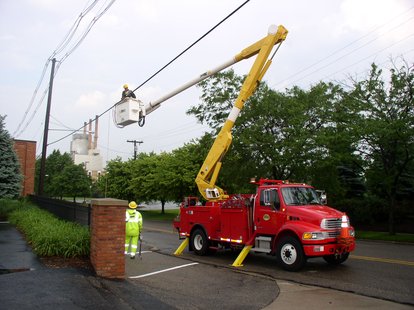 Holland BPW Crews work on repairing downed power lines. Holland BPW Crews work on repairing downed power lines.
