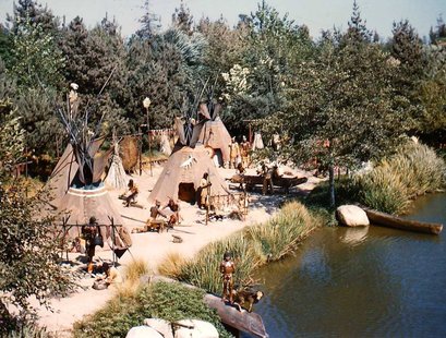 A photograph of an indian village by a lake. A photograph of an indian village by a lake.