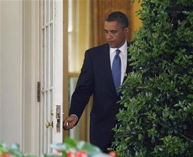 
President Barack Obama walks out of the Oval Office in the Rose Garden of the White House in Washington, June 23, 2010. REUTERS/Larry Downing
