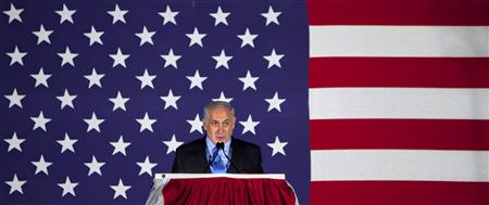 
Israeli Prime Minister Benjamin Netanyahu speaks during a ceremony to mark July 4th, U.S. Independence Day, at the residence of the U.S. ambassador in Hertzeliya, July 1, 2010. REUTERS/Oded Balilty/ Pool
