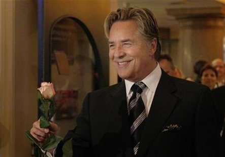 Don Johnson arrives with a rose for a musical premiere of "Miami Nights" in Munich November 7, 2007. REUTERS/Michaela Rehle
Don Johnson arrives with a rose for a musical premiere of "Miami Nights" in Munich November 7, 2007. REUTERS/Michaela Rehle