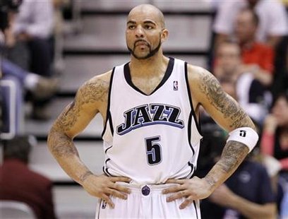 Utah Jazz forward Carlos Boozer stands with his hands on his hips as his team is swept by the Los Angeles Lakers during Game 4 of their NBA Western Conference semi-final playoff series in Salt Lake City, Utah, May 10, 2010. REUTERS/Lucy Nicholson
Utah Jazz forward Carlos Boozer stands with his hands on his hips as his team is swept by the Los Angeles Lakers during Game 4 of their NBA Western Conference semi-final playoff series in Salt Lake City, Utah, May 10, 2010. REUTERS/Lucy Nicholson