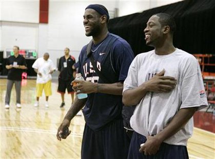 
LeBron James (L) of the Cleveland Cavaliers and Dwyane Wade of the Miami Heat laugh during a training camp with the USA Basketball Men's Senior National Team at the Cox Pavilion in Las Vegas, Nevada July 20, 2007. REUTERS/Steve Marcus
