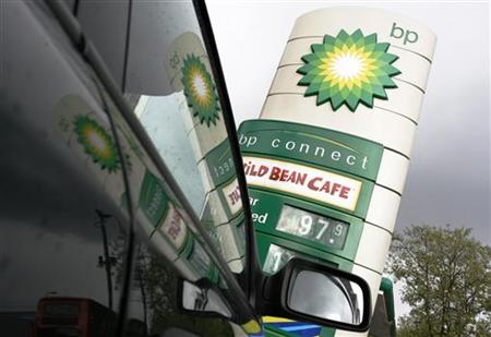 
A BP petrol station is reflected in a car, in London April 28, 2009. REUTERS/Luke MacGregor
