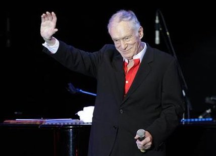 Playboy magazine founder Hugh Hefner waves to the audience during the Playboy magazine's 2010 Playmate of the Year celebration at the Palms Casino Resort in Las Vegas, Nevada May 15, 2010. Hope Dworaczyk, 25, Playboy magazine's 2010 Playmate of the Year, is featured in the June issue of Playboy magazine and in the magazine's first 3-D centerfold. REUTERS/Steve Marcus
Playboy magazine founder Hugh Hefner waves to the audience during the Playboy magazine's 2010 Playmate of the Year celebration at the Palms Casino Resort in Las Vegas, Nevada May 15, 2010. Hope Dworaczyk, 25, Playboy magazine's 2010 Playmate of the Year, is featured in the June issue of Playboy magazine and in the magazine's first 3-D centerfold. REUTERS/Steve Marcus
