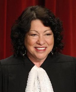 
Supreme Court Justice Sonia Sotomayor poses for an official photograph with the other Justices at the Supreme Court in Washington, September 29, 2009. REUTERS/Jim Young

