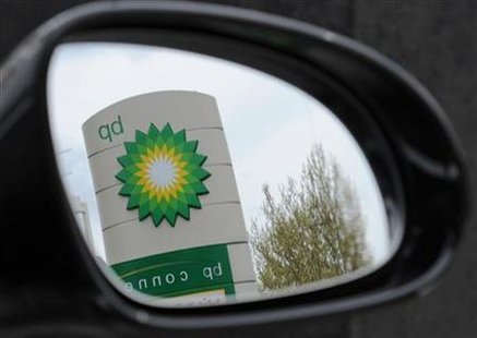 
A British Petroleum (BP) logo is seen reflected in a car mirror at a petrol station in south London April 27, 2010. REUTERS/Toby Melville
