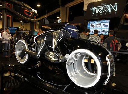 A replica motorcycle from Disney's new movie "Tron: Legacy" is displayed during Comic Con in San Diego, California July 22, 2010. REUTERS/Mike Blake
A replica motorcycle from Disney's new movie "Tron: Legacy" is displayed during Comic Con in San Diego, California July 22, 2010. REUTERS/Mike Blake