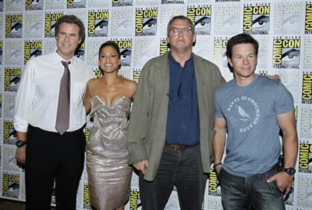 
(From L to R)Cast members from the upcoming film "The Other Guys", Will Ferrell, Eva Mendes, Adam McKay and Mark Wahlberg, pose after a news conference at Comic Con in San Diego, California, July 23, 2010. REUTERS/Mike Blake
