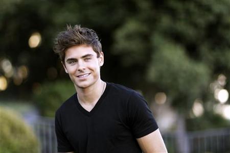 
U.S. actor Zac Efron, who stars in the movie "Charlie St. Cloud", poses for a photo in Marina del Rey, California, July 16, 2010. REUTERS/Mario Anzuoni
