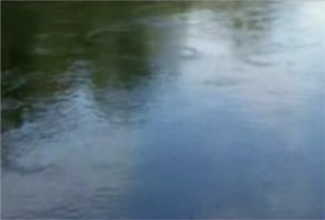 The Kalamazoo River flows as crews cleanup the Enbridge Energy Partners Oil Spill.