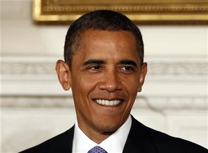 
President Barack Obama before he signs into law the Improper Payments Elimination and Recovery Act in the State Dining Room of the White House in Washington, July 22, 2010. REUTERS/Larry Downing
