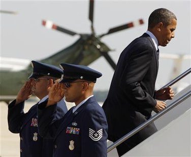 
U.S. President Barack Obama prepares to depart Andrews Air Force Base outside Washington, for a day trip to Detroit, July 30, 2010. REUTERS/Larry Downing
