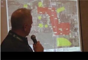Calhoun County Health Officer Jim Rutherford points to the areas involved in the Kalamazoo River oil spill.