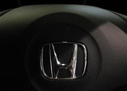 Honda Motor's logo on its hybrid coupe CR-Z is seen at its showroom in Tokyo in this July 30, 2010 file photo. REUTERS/Kim Kyung-Hoon
Honda Motor's logo on its hybrid coupe CR-Z is seen at its showroom in Tokyo in this July 30, 2010 file photo. REUTERS/Kim Kyung-Hoon