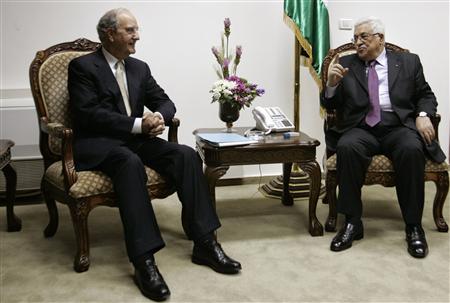 
Palestinian President Mahmoud Abbas (R) sits with U.S. Middle East envoy George Mitchell during their meeting in the West Bank city of Ramallah August 10, 2010. REUTERS/Majdi Mohammed/Pool

