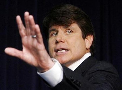 rod blagojevich trial. Then Illinois Governor Rod Blagojevich waves to the media after he addressed