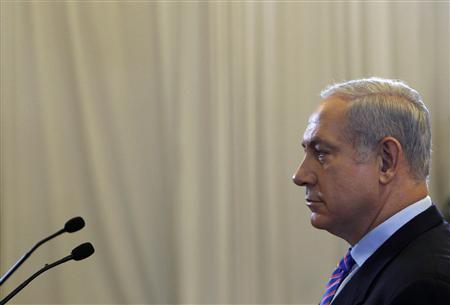 
Israel's Prime Minister Benjamin Netanyahu is seen before testifying to a state-appointed inquiry into the Israeli naval raid on a Gaza aid flotilla, in Jerusalem August 9, 2010. REUTERS/Ronen Zvulun
