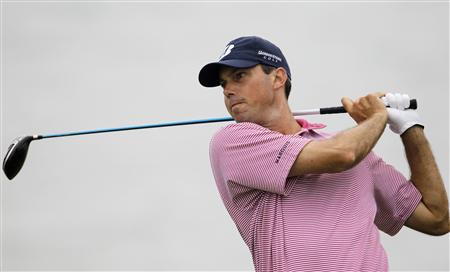 
Matt Kuchar of the U.S. tees off on the eighth hole during the conclusion of the weather-delayed first round of the 92nd PGA Golf Championship at Whistling Straits, in Kohler, Wisconsin, August 13, 2010. REUTERS/Mathieu Belanger
