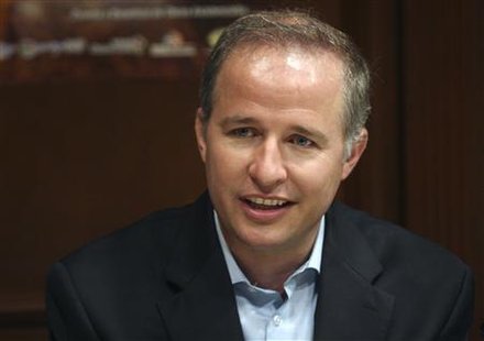 
Edelmiro Cavazos, mayor of the tourist town of Santiago smiles during a visit to Monterrey, in this February 24, 2010 file photo. REUTERS/Kristian Lopez/Files
