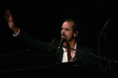 Australian singer Nick Cave performs during his "Solo show" in Malaga, southern Spain, April 22, 2007. REUTERS/ Jon Nazca
Australian singer Nick Cave performs during his "Solo show" in Malaga, southern Spain, April 22, 2007. REUTERS/ Jon Nazca