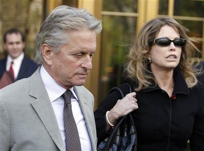 Michael Douglas and his ex-wife Diandra Douglas leave a Manhattan federal court after the sentencing of their son in New York in this April 20, 2010 file photo. REUTERS/Shannon Stapleton/Files
Michael Douglas and his ex-wife Diandra Douglas leave a Manhattan federal court after the sentencing of their son in New York in this April 20, 2010 file photo. REUTERS/Shannon Stapleton/Files