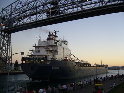 A ship passes through the Ariel Lift Bridge, located in Duluth, MN.  Photo courtesy of Joseph Yetman Photography, LLC   josephyetmanphotography.com