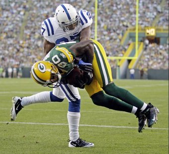 Green Bay Packers wide receiver Donald Driver (80) catches a touchdown pass in front of Indianapolis Colts cornerback Jacob Lacey (27) during the first half of an NFL preseason football game Thursday, Aug. 26, 2010, in Green Bay, Wis. (AP Photo/Morry Gash) Green Bay Packers wide receiver Donald Driver (80) catches a touchdown pass in front of Indianapolis Colts cornerback Jacob Lacey (27) during the first half of an NFL preseason football game Thursday, Aug. 26, 2010, in Green Bay, Wis. (AP Photo/Morry Gash)