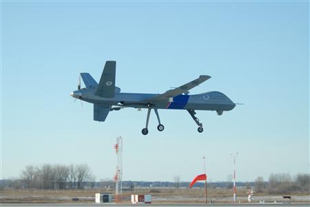 The U.S. Customs and Border Protection's first MQ-9 Predator B unmanned aerial vehicle to be stationed along the northern border of the United States lands at Grand Forks Air Force Base, N.D., Dec. 6, 2008. REUTERS/Department of Defense/Senior Master Sgt. David H. Lipp/Handout
The U.S. Customs and Border Protection's first MQ-9 Predator B unmanned aerial vehicle to be stationed along the northern border of the United States lands at Grand Forks Air Force Base, N.D., Dec. 6, 2008. REUTERS/Department of Defense/Senior Master Sgt. David H. Lipp/Handout