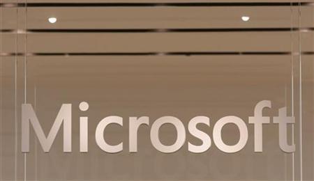 
The Microsoft logo hangs from a window during the grand opening of Microsoft's first retail store in Scottsdale, Arizona October 22, 2009. REUTERS/Joshua Lott
