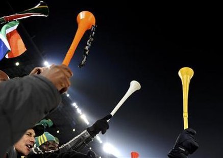 
Fans hold vuvuzelas ahead of the 2010 World Cup Group A soccer match between South Africa and Uruguay at Loftus Versfeld stadium in Pretoria in this June 16, 2010 file photo. REUTERS/Dylan Martinez
