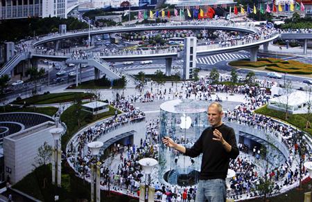 
Apple Chief Executive Steve Jobs speaks on stage, with the Shanghai Apple store displayed on screen, at Apple's media event in San Francisco, September 1, 2010. REUTERS/Robert Galbraith
