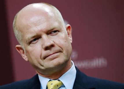 
Britain's Foreign Secretary William Hague listens to a question during a news conference with his German counterpart Guido Westerwelle at the Foreign and Commonwealth Office in London September 2, 2010. REUTERS/Luke MacGregor
