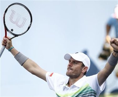 
Mardy Fish of the U.S. celebrates his win over Jan Hajek of the Czech Republic during the U.S. Open tennis tournament in New York, August 31, 2010. REUTERS/Kevin Lamarque
