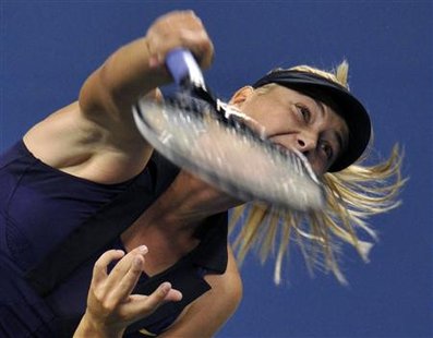 
Maria Sharapova of Russia serves to Iveta Benesova of the Czech Republic during the U.S. Open tennis tournament in New York, September 2, 2010. REUTERS/Ray Stubblebine
