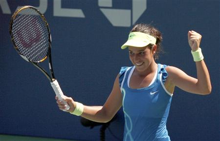 
Beatrice Capra of the U.S. celebrates her win over Aravane Rezai of France at the US Open tennis tournament in New York, September 2, 2010. REUTERS/Jessica Rinaldi
