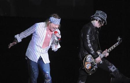 Axl Rose (L), lead singer of the U.S. band Guns N' Roses, and a guitarist of the band perform during the Chinese Democracy World Tour 2010 in Montevideo March 18, 2010. REUTERS/Patricia Torres
Axl Rose (L), lead singer of the U.S. band Guns N' Roses, and a guitarist of the band perform during the Chinese Democracy World Tour 2010 in Montevideo March 18, 2010. REUTERS/Patricia Torres