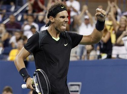 
Rafael Nadal of Spain celebrates defeating Denis Istomin of Uzbekistan during the U.S. Open tennis tournament in New York, September 3, 2010. REUTERS/Shannon Stapleton
