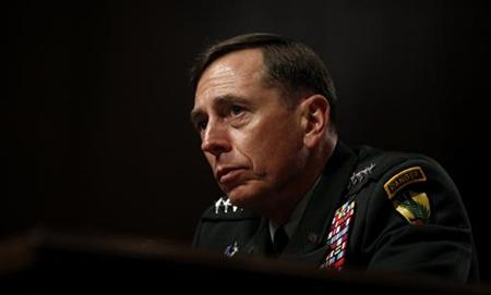 U.S. General David Petraeus testifies at his Senate Armed Services Committee confirmation hearing to become commander of U.S. forces in Afghanistan on Capitol Hill in Washington June 29, 2010. REUTERS/Kevin Lamarque
U.S. General David Petraeus testifies at his Senate Armed Services Committee confirmation hearing to become commander of U.S. forces in Afghanistan on Capitol Hill in Washington June 29, 2010. REUTERS/Kevin Lamarque
