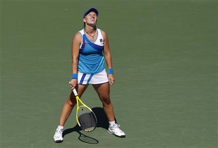 
Svetlana Kuznetsova of Russia reacts to a poor shot against Dominika Cibulkova of Slovakia during the U.S. Open tennis tournament in New York, September 6, 2010. REUTERS/Jessica Rinaldi
