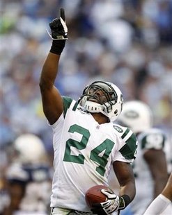 
New York Jets cornerback Darrelle Revis celebrates an interception against the San Diego Chargers in the third quarter of their NFL Divisional playoff football game in San Diego, California in this January 17, 2010 file photo. REUTERS/Mike Blake
