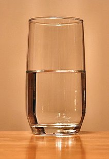A glass of drinking water.