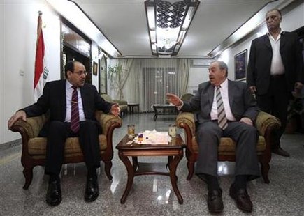 
Iraq's Prime Minister Nuri al-Maliki (L) meets with Iraq's former Prime Minister and head of the Iraqiya coalition Iyad Allawi (R) in Baghdad June 29, 2010. REUTERS/Mohammed Ameen
