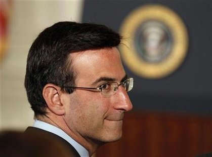 
Office of Management and Budget (OMB) Director Peter Orszag waits for U.S. President Barack Obama to sign into law the Improper Payments Elimination and Recovery Act in the State Dining Room of the White House in Washington, July 22, 2010. REUTERS/Larry Downing
