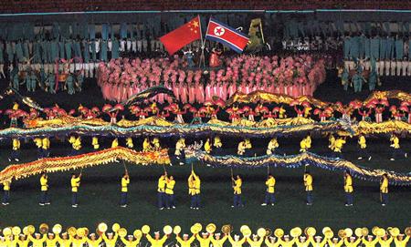 
North Koreans perform Arirang Mass Games' chapter 5, named "Goodwill Arirang" in Pyongyang September 6, 2010 in this photo released by North Korea's KCNA news agency on Monday. The chapter 5 describes the friendship and the unity between North Korea and China according to KCNA. REUTERS/KCNA
