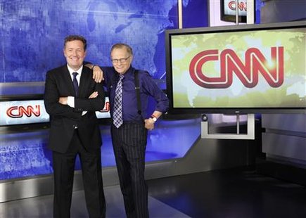 
British television host Piers Morgan (L) and veteran CNN talk show host Larry King (R) are shown in this undated publicity photograph. REUTERS/CNN/Handout
