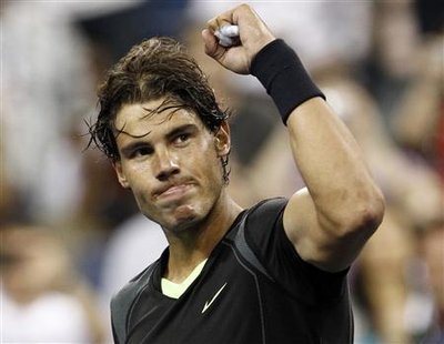 
Rafael Nadal of Spain celebrates defeating compatriot Feliciano Lopez during the U.S. Open tennis tournament in New York September 7, 2010. REUTERS/Kevin Lamarque
