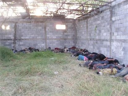 
The blindfolded and hand-tied bodies of migrant workers lie at a ranch where they were discovered by Mexican marines in San Fernando, Tamaulipas state. Photo released August 26, 2010. REUTERS/Tamaulipas' State Attorney General's Office/Handout
