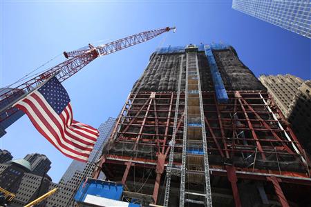 
Cranes haul supplies into the building being built at One World Trade Center at the World Trade Center construction site in New York September 8, 2010. REUTERS/Lucas Jackson
